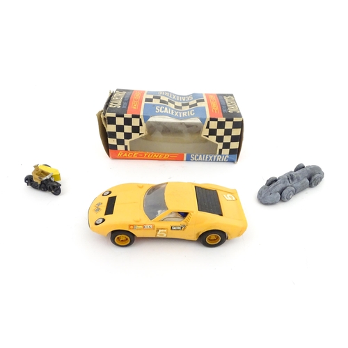 847 - Toys: Three assorted scale model vehicles to include a boxed Scalextric C9 Ferrari GP race car in ye... 