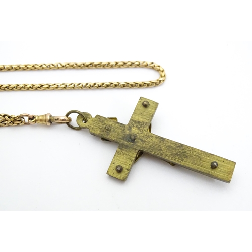 710 - Six assorted cross / cruciform pendants on chains, to include some silver examples. Largest pendant ... 