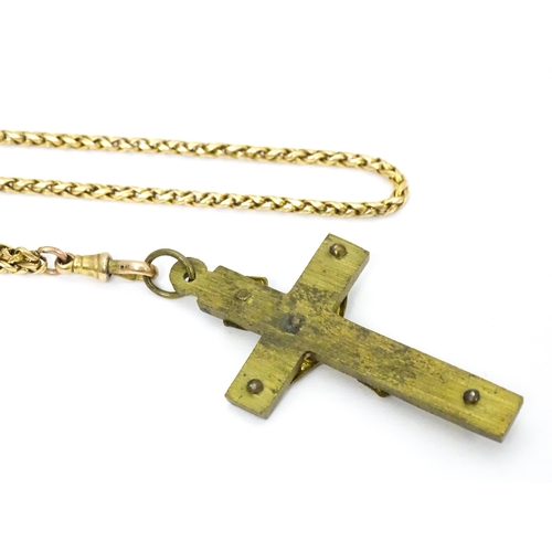 710 - Six assorted cross / cruciform pendants on chains, to include some silver examples. Largest pendant ... 