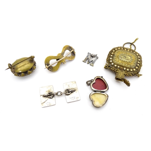 723 - Assorted jewellery to include silver chains, pendants, yellow metal bow formed brooch with garnet ca... 