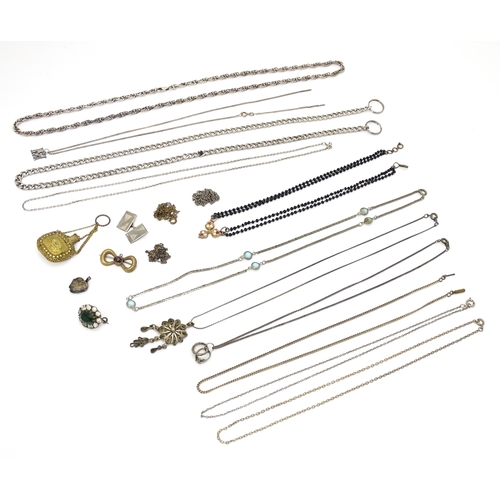 723 - Assorted jewellery to include silver chains, pendants, yellow metal bow formed brooch with garnet ca... 