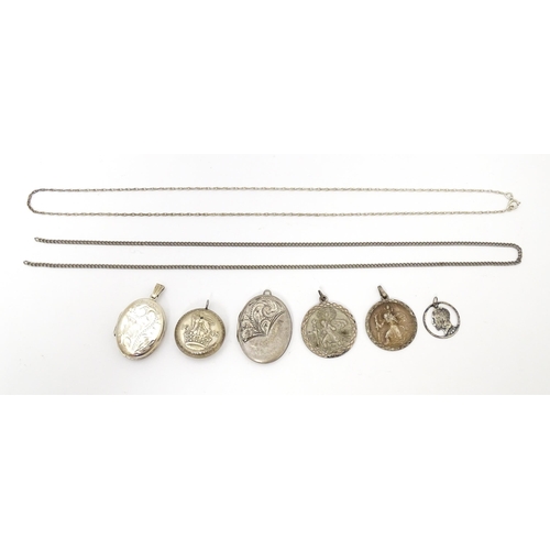 740 - A quantity of assorted silver and white metal pendants and chains to include lockets, St Christopher... 