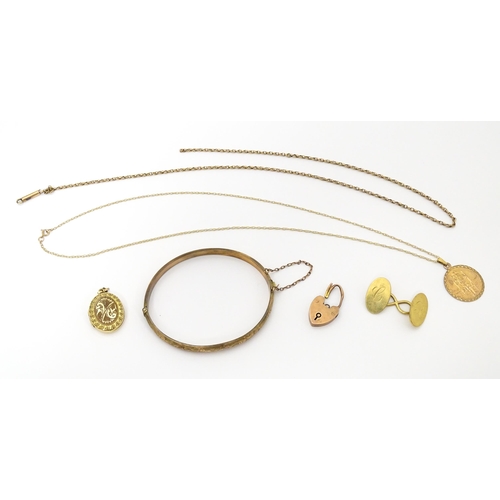 741 - Assorted gold, yellow metal and gilt metal items to include a single 18ct gold cufflink, a 9ct gold ... 