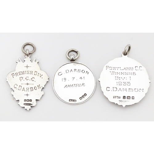 750 - Seven assorted hallmarked silver trophy fobs to include examples for Portland Cricket Club, Paddingt... 