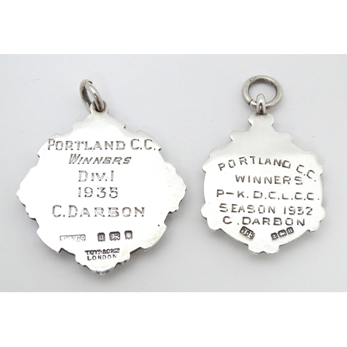 750 - Seven assorted hallmarked silver trophy fobs to include examples for Portland Cricket Club, Paddingt... 