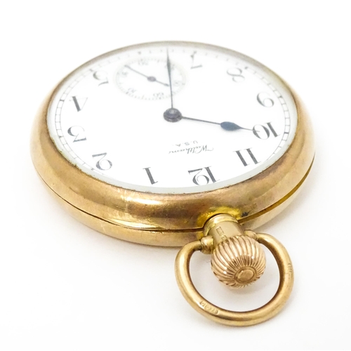 754 - A Waltham USA 9ct gold cased open face pocket watch, the white enamel dial with Arabic numerals and ... 