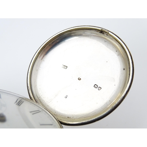 756 - A Victorian silver hunter pocket watch, the white enamel dial with Roman numerals and subsidiary sec... 