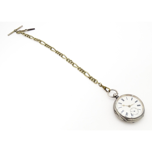 757 - A silver pocket watch with white enamel dial with Roman numerals and subsidiary seconds dial. The ca... 