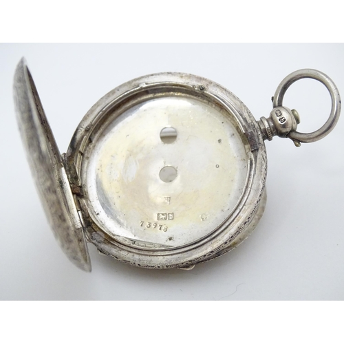 762 - A Continental .800 silver corsage / fob watch with white enamel dial, Roman numerals and floral deta... 