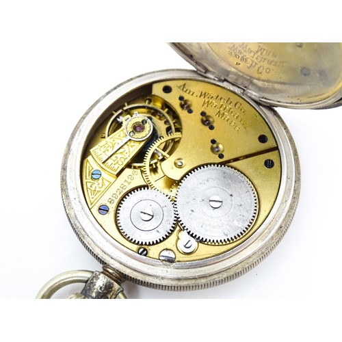 755 - A Victorian silver pocket watch, the white enamel dial with Roman numerals and subsidiary seconds di... 