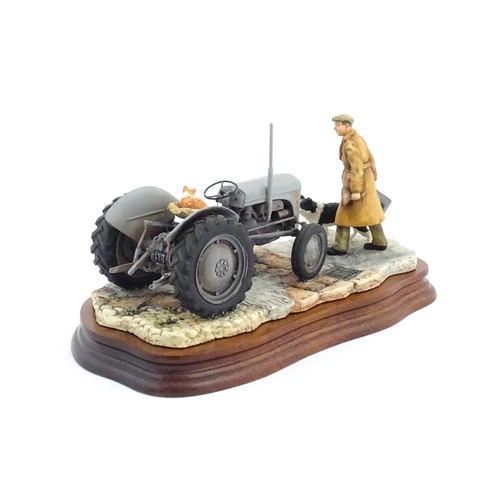 899 - A Border Fine Arts James Herriot model An Early Start by Ray Ayres, model no. JH91. Model approx. 9 ... 