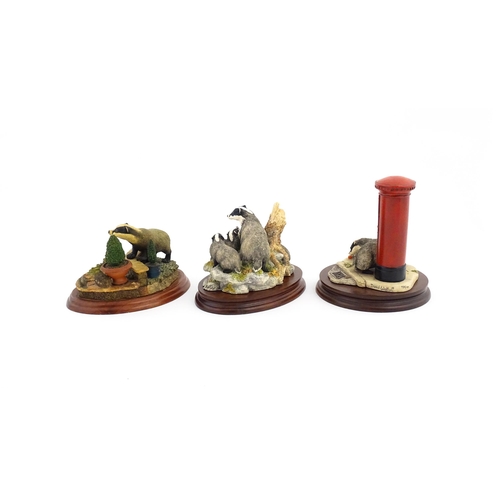 912 - Three Border Fine Arts model badgers comprising Urban Badgers L151, Garden Intruder A1874, and Eveni... 