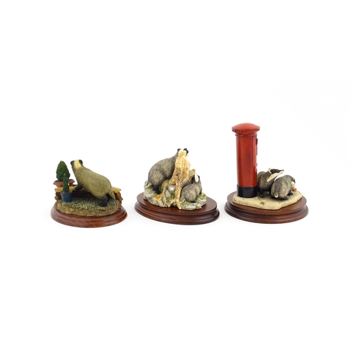 912 - Three Border Fine Arts model badgers comprising Urban Badgers L151, Garden Intruder A1874, and Eveni... 