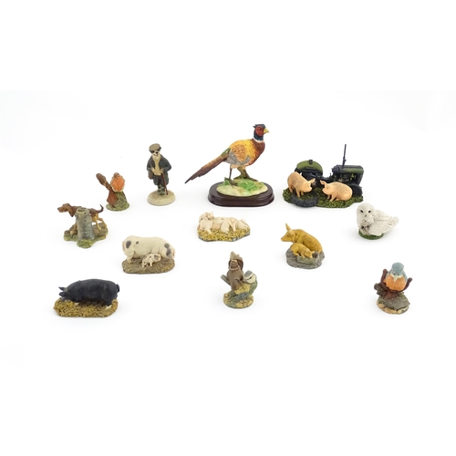 926 - A quantity of assorted model animals to include a Leonardo Collection pheasant, Royal Doulton exampl... 