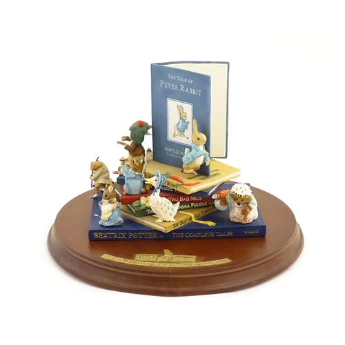 927 - A Westminster Editions Beatrix Potter Peter Rabbit Centenary model depicting characters from Peter R... 