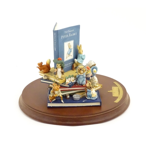 927 - A Westminster Editions Beatrix Potter Peter Rabbit Centenary model depicting characters from Peter R... 