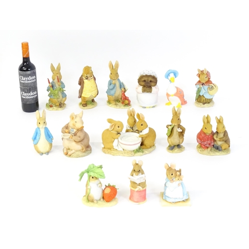 932 - A quantity of Border Fine Arts Beatrix Potter figures to include Peter Rabbit eating Radishes A1932,... 