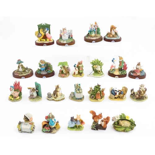 933 - A quantity of Border Fine Arts Beatrix Potter figures from the World of Beatrix Potter series etc. t... 