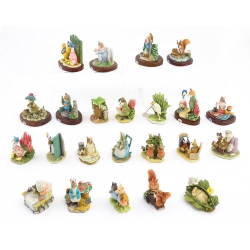 933 - A quantity of Border Fine Arts Beatrix Potter figures from the World of Beatrix Potter series etc. t... 