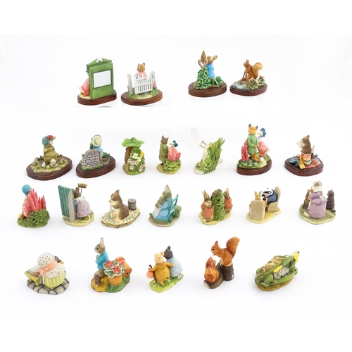 933 - A quantity of Border Fine Arts Beatrix Potter figures from the World of Beatrix Potter series etc. t... 