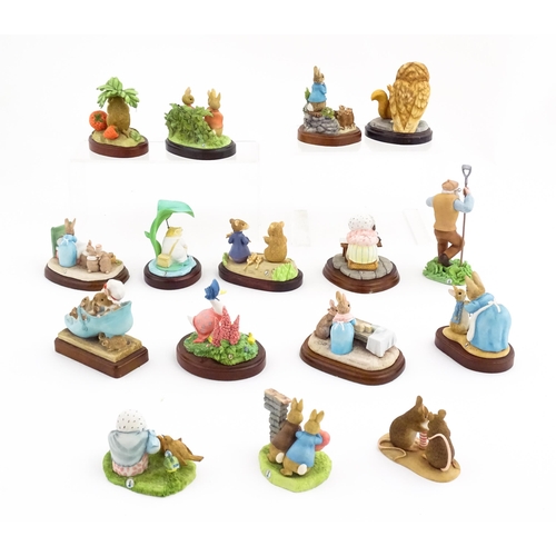 934 - A quantity of Border Fine Arts Beatrix Potter figures from Friends of Peter Rabbit Club, etc. to inc... 