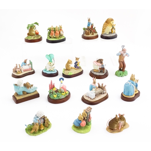 934 - A quantity of Border Fine Arts Beatrix Potter figures from Friends of Peter Rabbit Club, etc. to inc... 