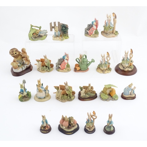 935 - A quantity of assorted Border Fine Arts Beatrix Potter figures from the Hamilton Collection, etc. to... 