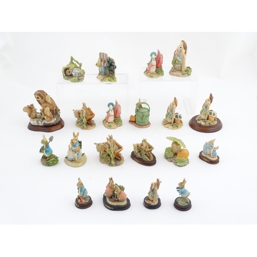 935 - A quantity of assorted Border Fine Arts Beatrix Potter figures from the Hamilton Collection, etc. to... 