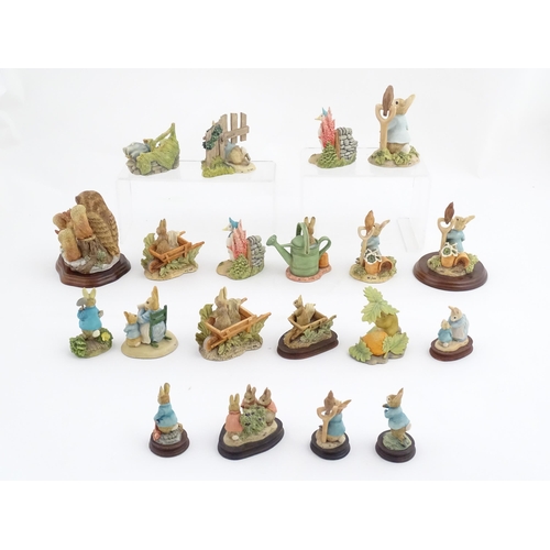 935 - A quantity of assorted Border Fine Arts Beatrix Potter figures from the Hamilton Collection, etc. to... 