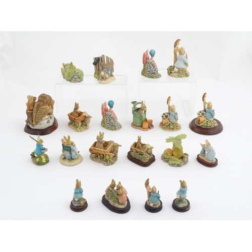 935 - A quantity of assorted Border Fine Arts Beatrix Potter figures from the Hamilton Collection, etc. to... 