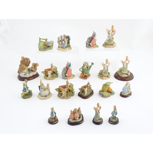 935 - A quantity of assorted Border Fine Arts Beatrix Potter figures from the Hamilton Collection, etc. to... 