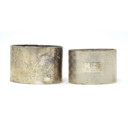 335 - A silver napkin ring hallmarked Sheffield 1928, maker Atkin Brothers. Together with another having e... 