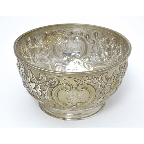 336 - A Victorian silver bowl with embossed decoration hallmarked London 1897, maker Dobson & Sons. Approx... 