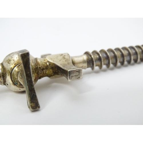 339 - A silver plate champagne tap. Approx. 3 3/4