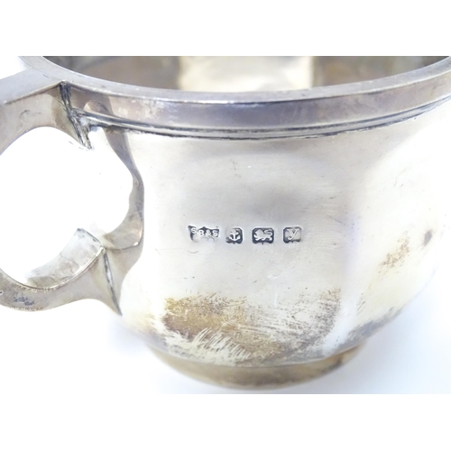 342 - A silver cup / mug hallmarked Birmingham 1923, maker S. Blanckensee & Son Ltd. Approx. 2 1/2