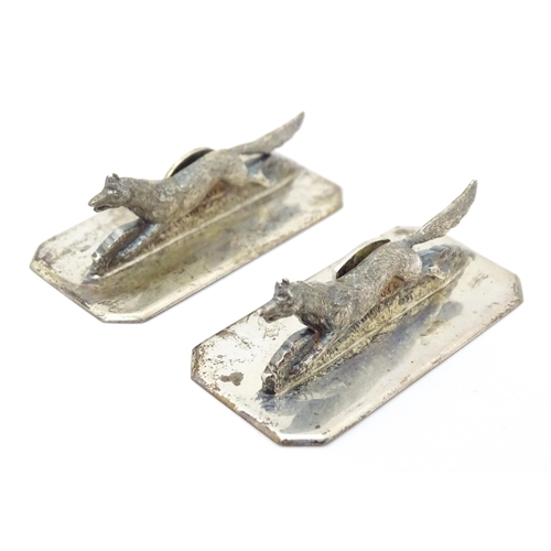 405 - A pair of silver table place card / menu holders with running fox detail, hallmarked London 1935, ma... 