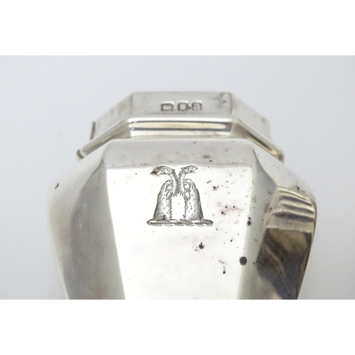 406 - A silver caster of octagonal form hallmarked London 1916, maker Crichton Brothers. Approx. 6 1/4