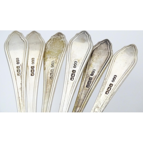 413 - A cased set of six silver teaspoons hallmarked Sheffield 1943, maker EJE. Approx. 4 1/4