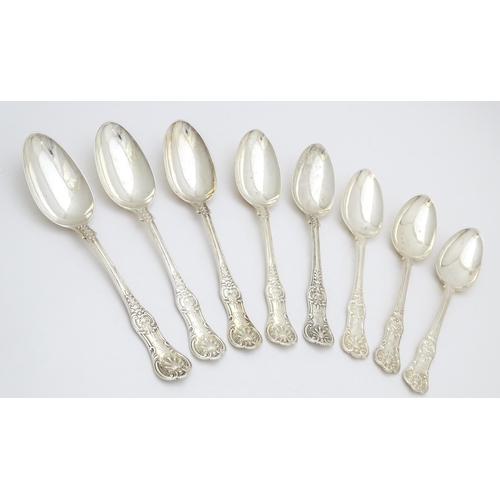 520 - Eight associated Victorian silver Kings pattern table spoons comprising two hallmarked London 1848 m... 