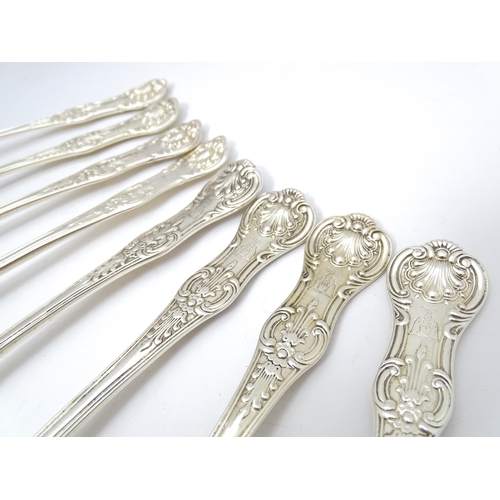 520 - Eight associated Victorian silver Kings pattern table spoons comprising two hallmarked London 1848 m... 