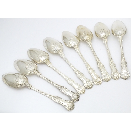 520 - Eight associated Victorian silver Kings pattern table spoons comprising two hallmarked London 1848 m... 