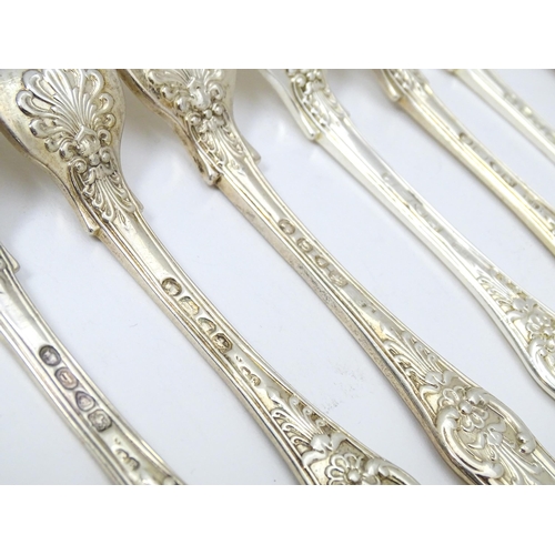 521 - Twenty four associated Victorian silver Kings pattern table forks comprising eight hallmarked London... 