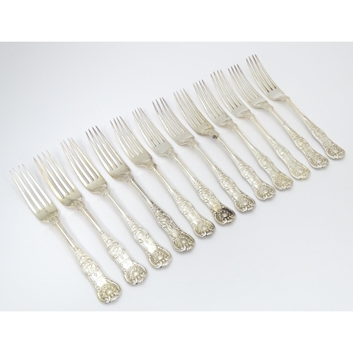 527 - Twelve associated Victorian silver Kings pattern dessert forks comprising five hallmarked London 184... 