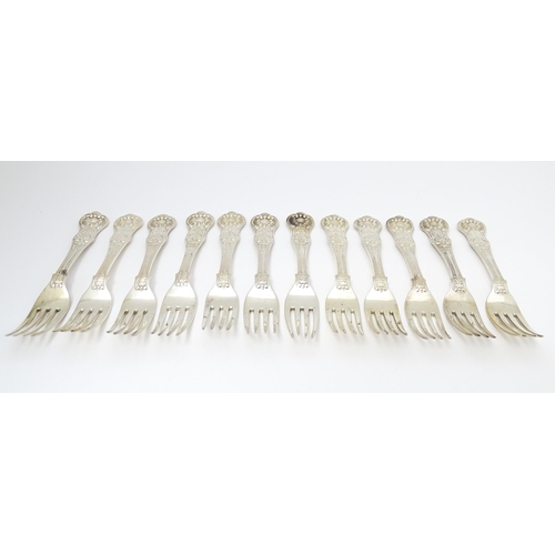 527 - Twelve associated Victorian silver Kings pattern dessert forks comprising five hallmarked London 184... 