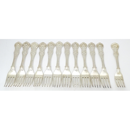 529 - Twelve associated Victorian silver Kings pattern table forks comprising eight hallmarked London 1848... 