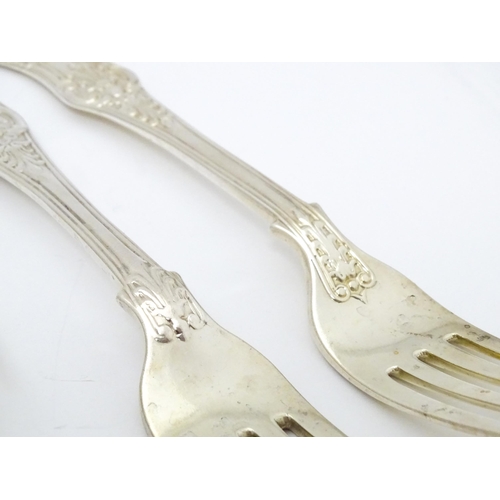 529 - Twelve associated Victorian silver Kings pattern table forks comprising eight hallmarked London 1848... 