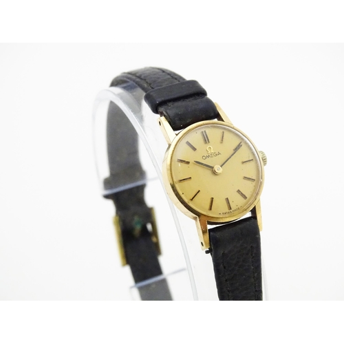 773 - A 9ct gold cased ladies Omega wristwatch. Watch dial approx. 3/4