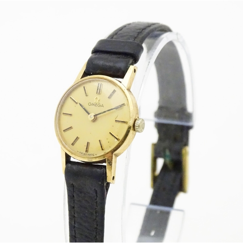 773 - A 9ct gold cased ladies Omega wristwatch. Watch dial approx. 3/4