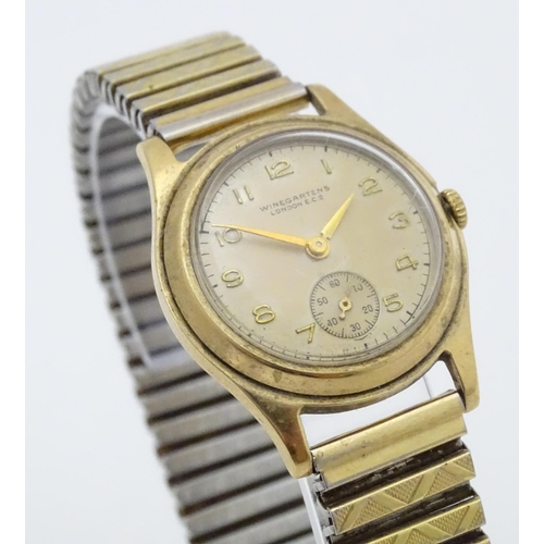 775 - A 9ct gold cased gentlemans wristwatch with Arabic numeral and subsidiary seconds dial, the dial sig... 