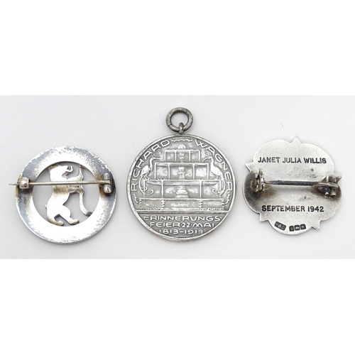 776 - Three assorted items comprising white metal badge titled Berlin Golf Club Founded 1895, a silver bad... 